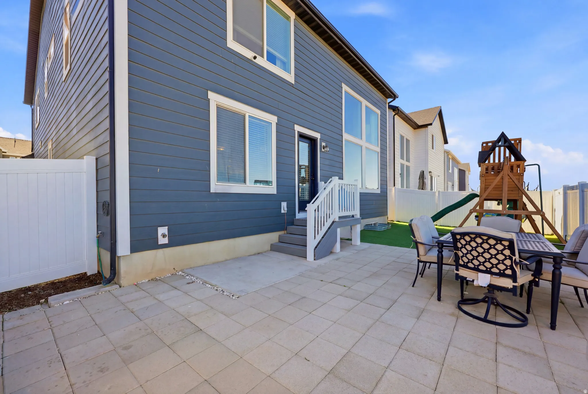 Spacious paver patio with direct access to the home