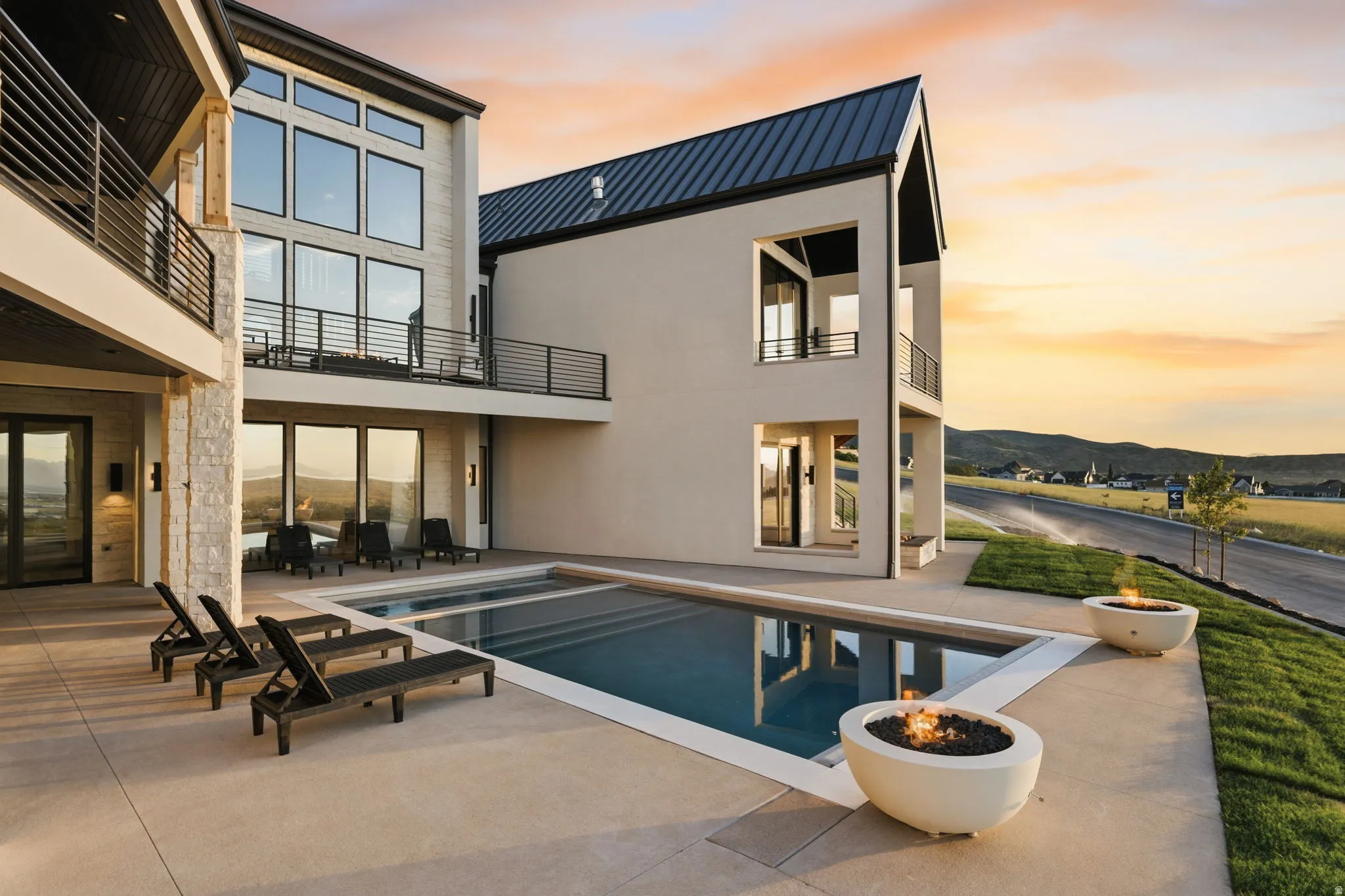 Contemporary exterior with a rectangular swimming pool and expansive concrete patio
