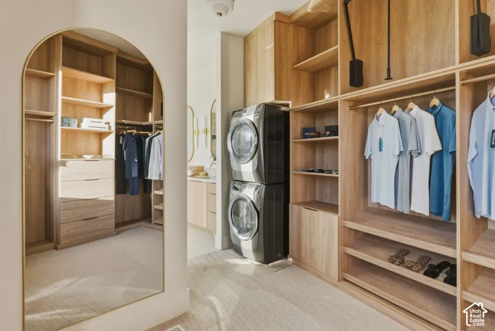 Integrated laundry appliances within a custom wood-finish closet system