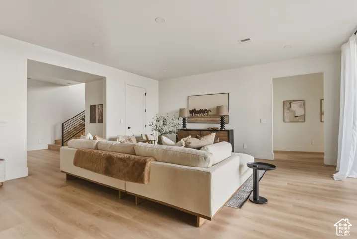 Bright interior space featuring light wood-finish flooring