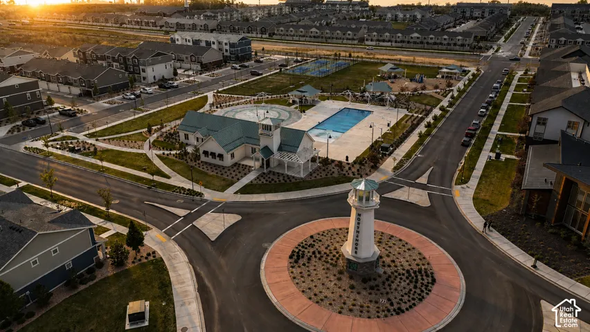 Community amenities including a swimming pool, children's play area, and clubhouse