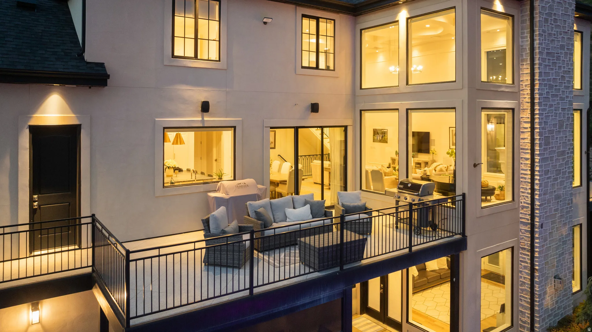 Expansive outdoor deck with black metal railings