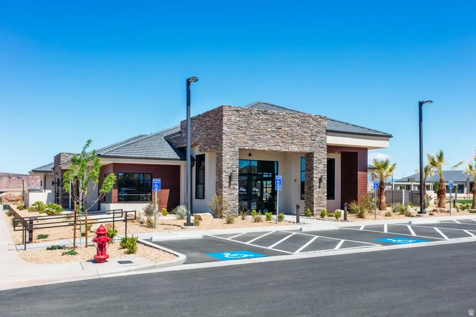 Modern architectural building featuring stone veneer accents and dark wood paneling