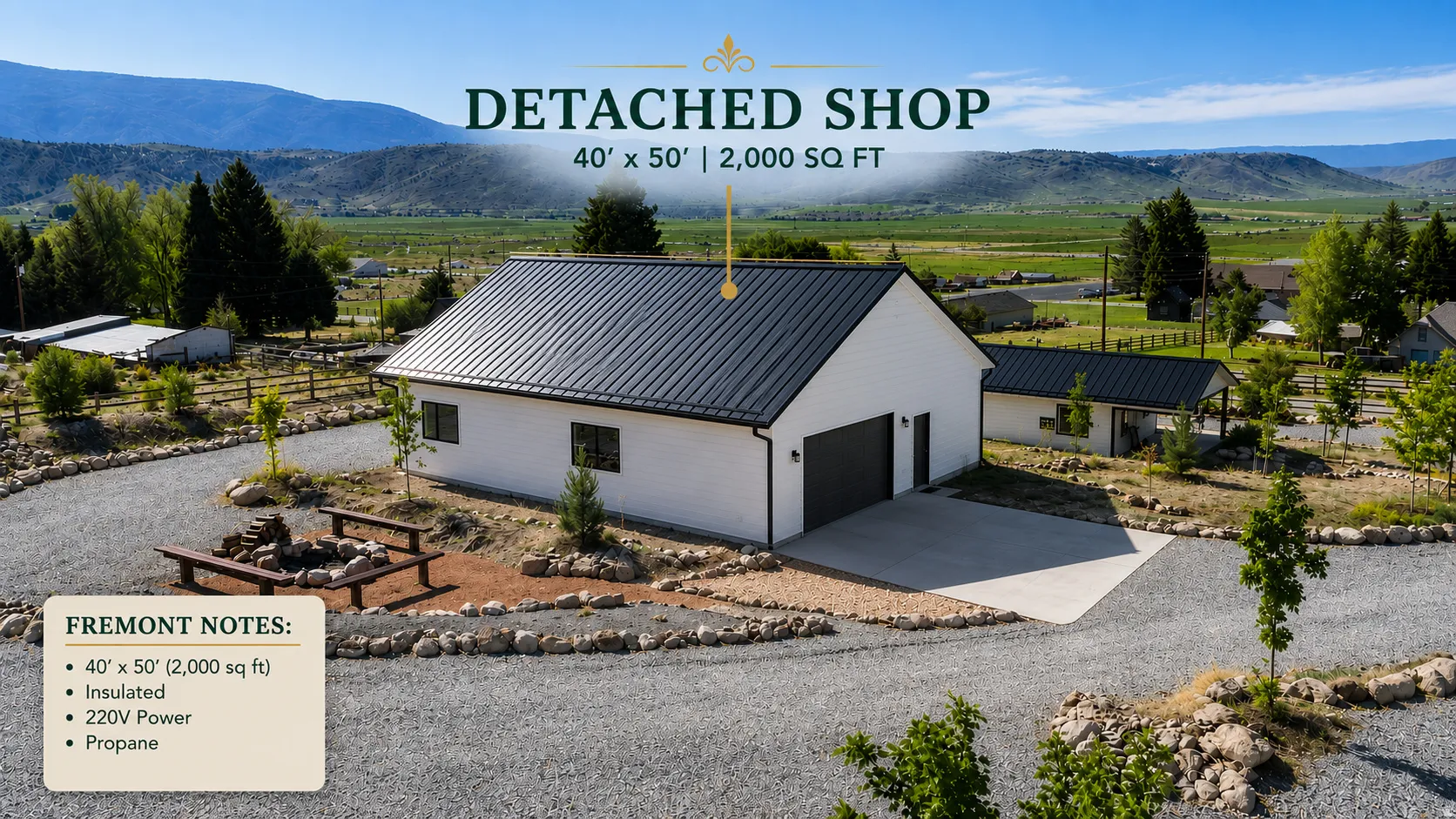 Detached shop building featuring white siding, a dark metal roof, and a concrete driveway