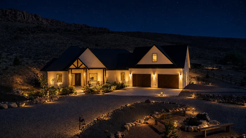 Contemporary architecture with a striking dark roofline and light-toned exterior