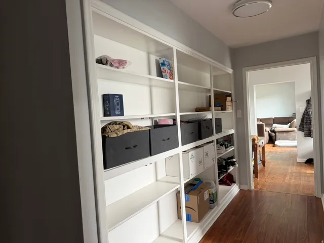 Built-in shelving unit featuring multiple adjustable shelves