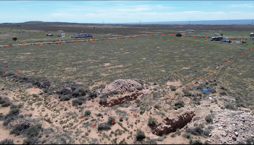 Expansive undeveloped land featuring natural desert vegetation