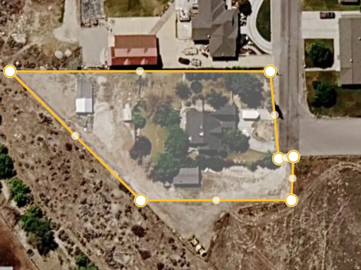 Property Survey Overlay. Indicating the boundary lines of the property on an aerial image