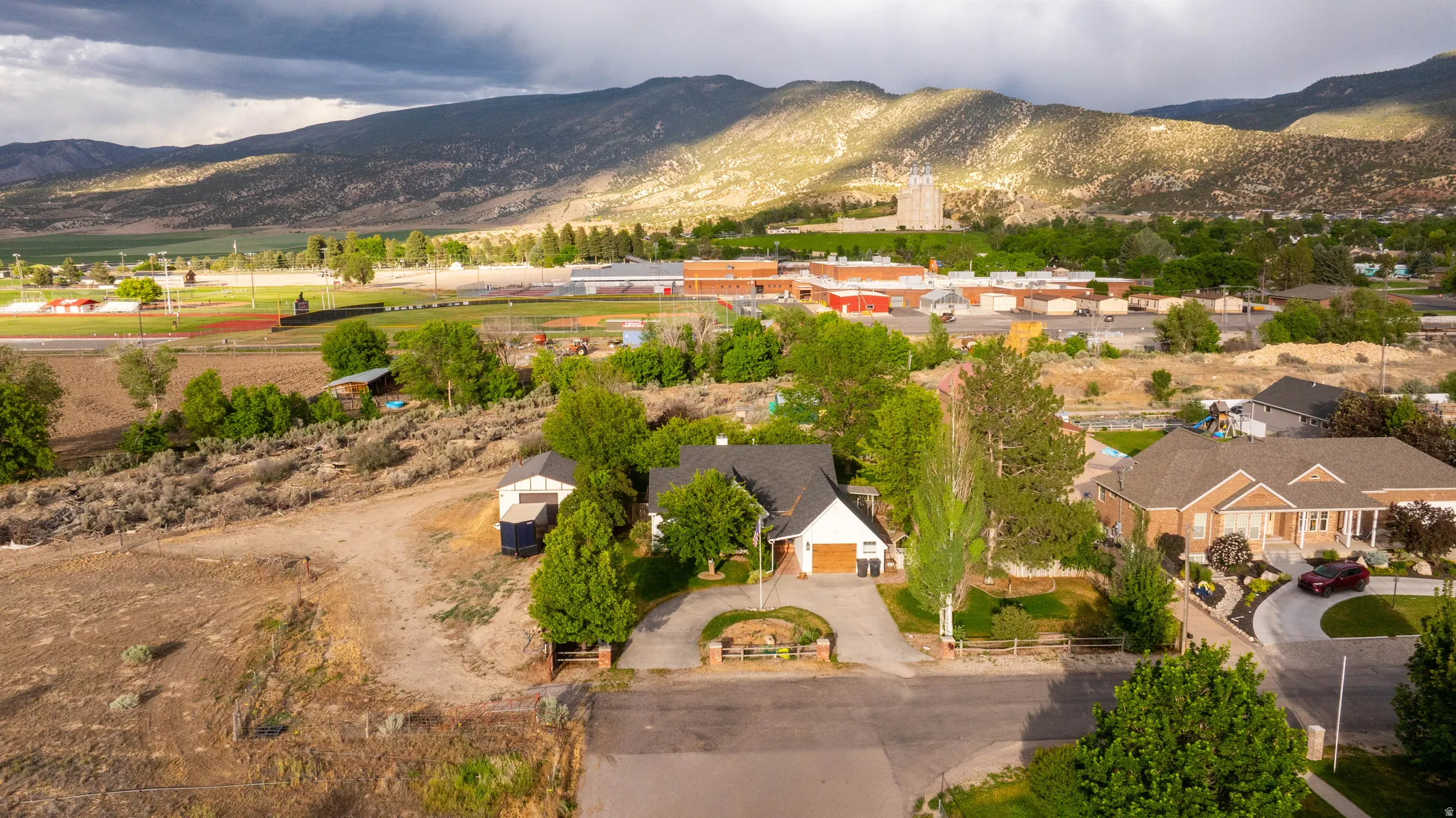 Aerial perspective highlighting a residential area with varied home styles