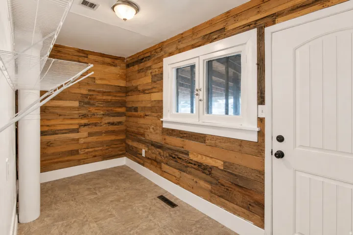 Accent wall featuring horizontal wood paneling
