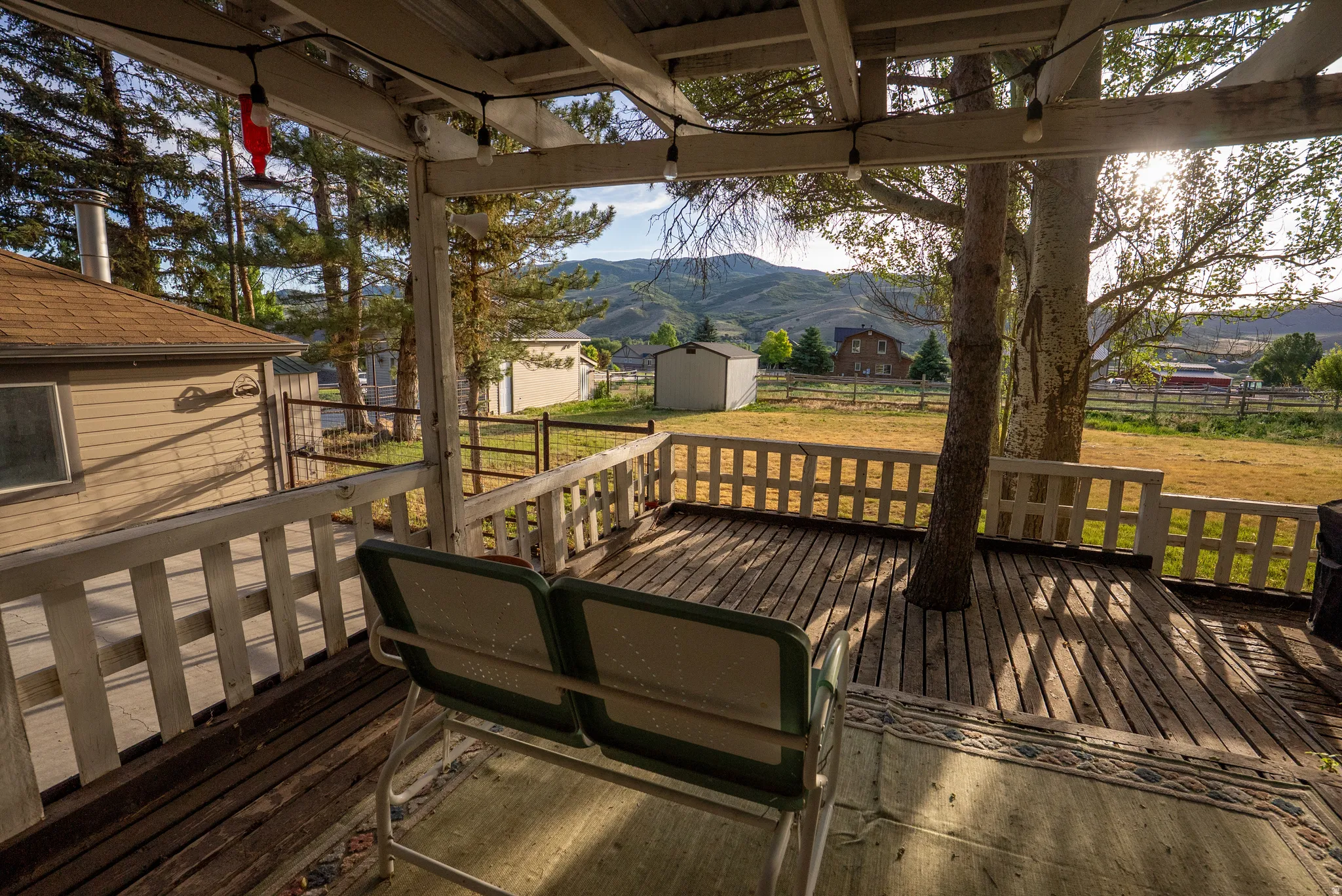 Expansive outdoor deck featuring wood flooring and a perimeter railing