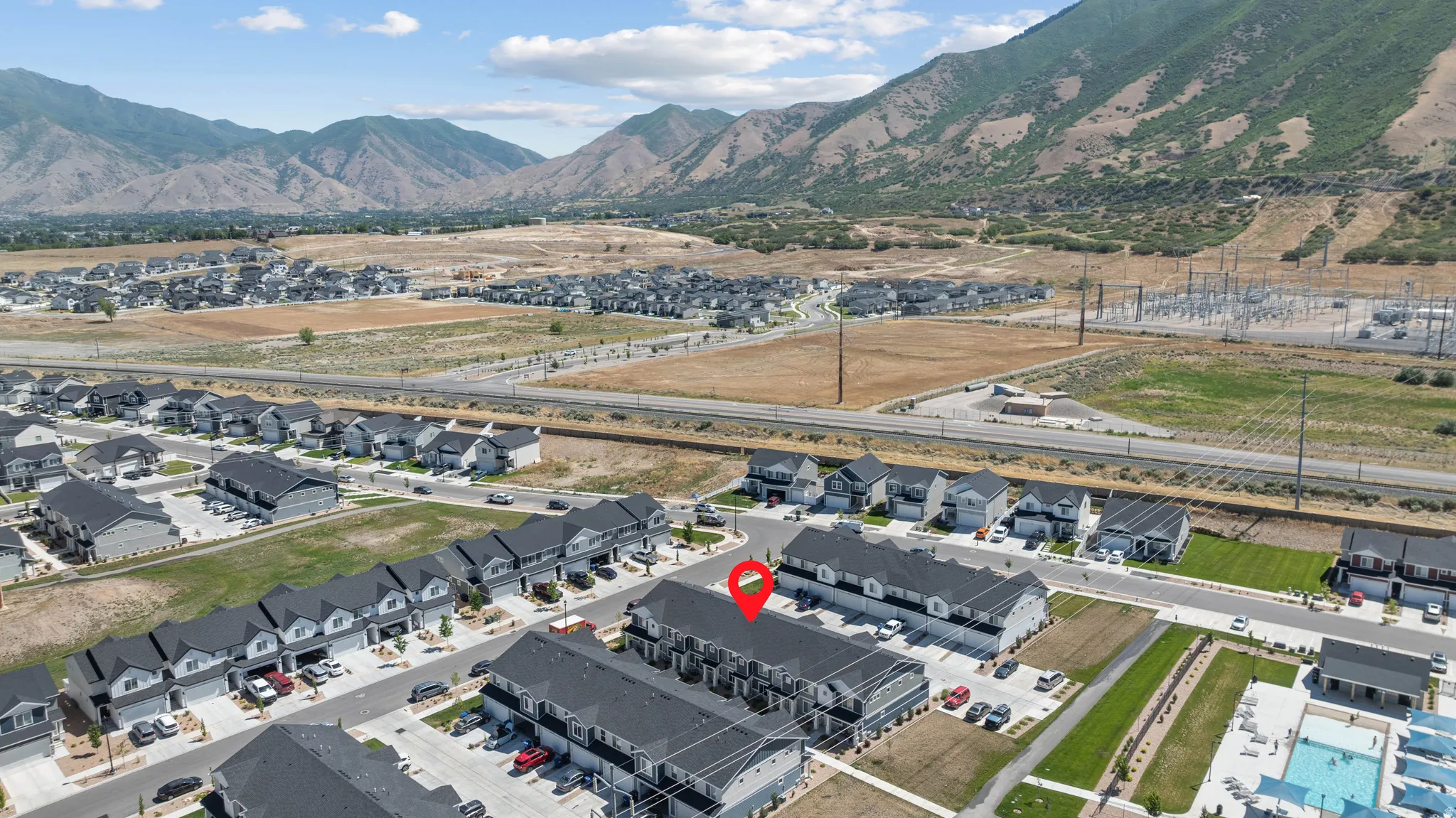 Modern townhome community with mountain scenery