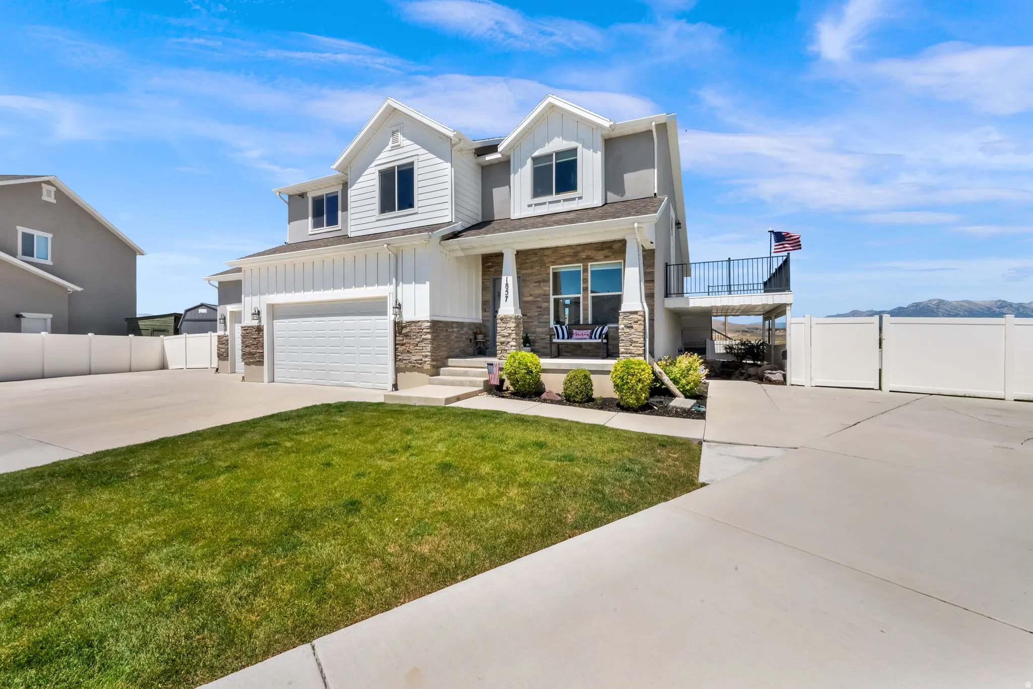 covered porch and covered basement apartment entrance with dedicated apartment parking