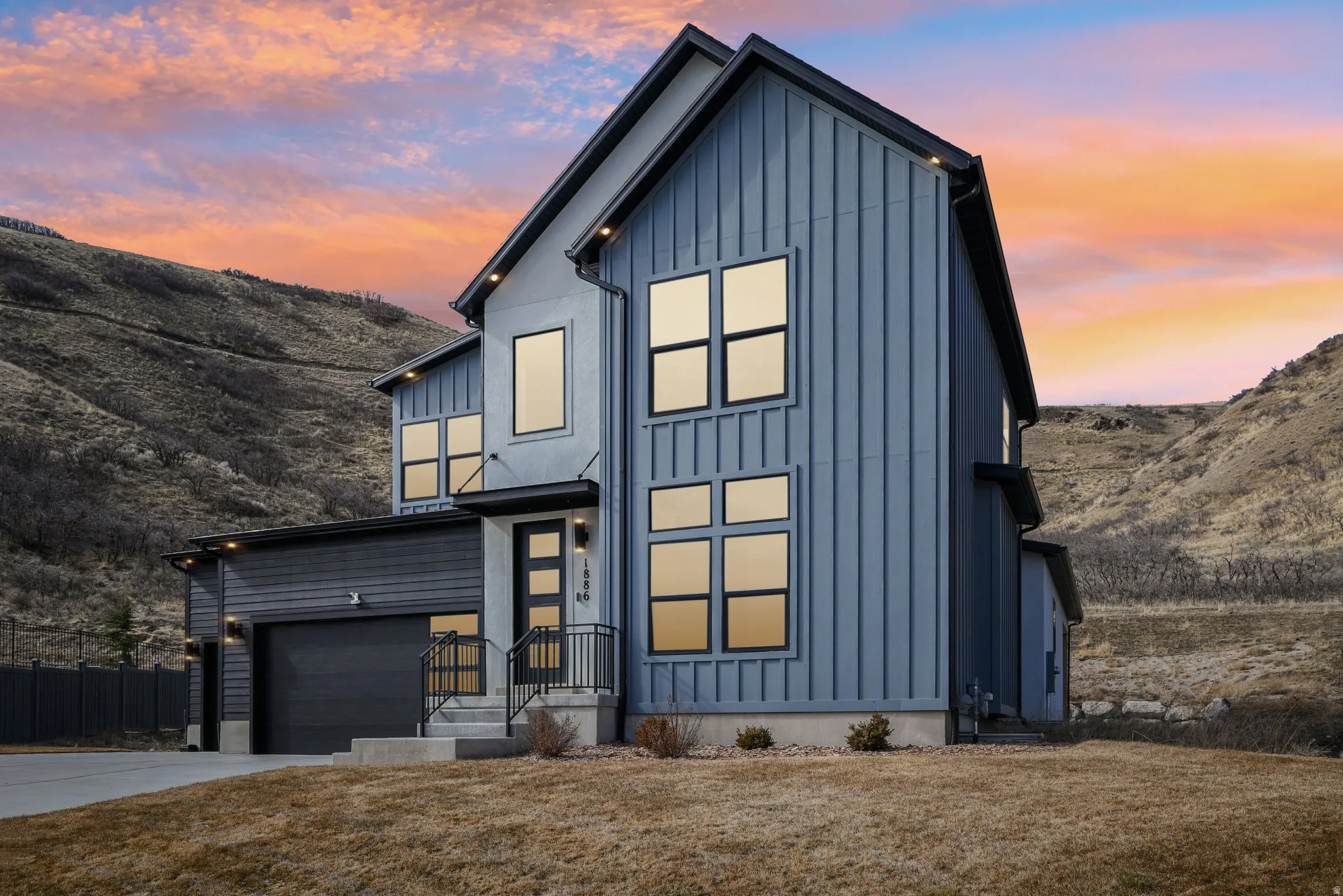Contemporary exterior with board and batten siding and contrasting horizontal siding elements