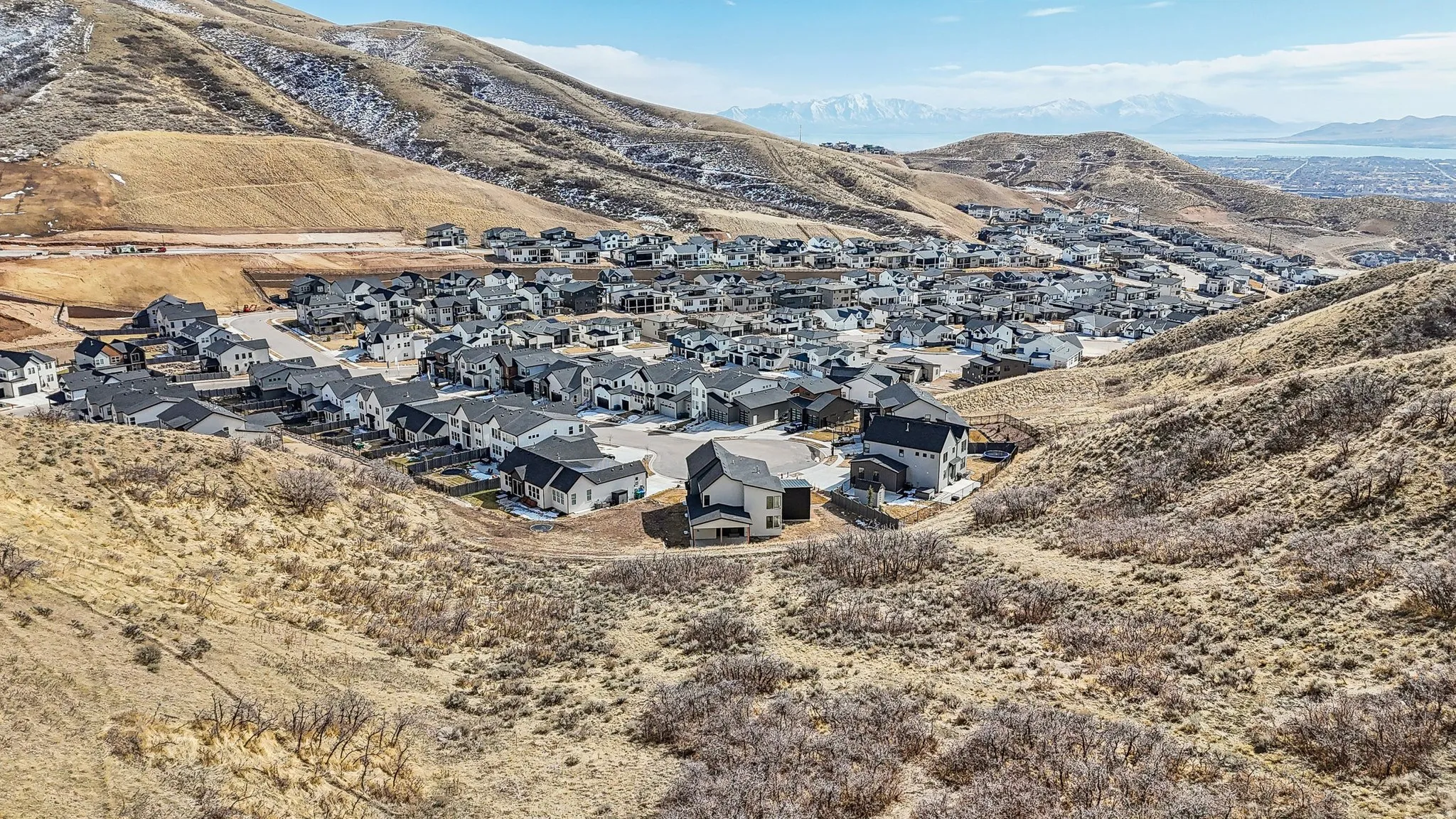 Modern residential development situated within a mountainous landscape