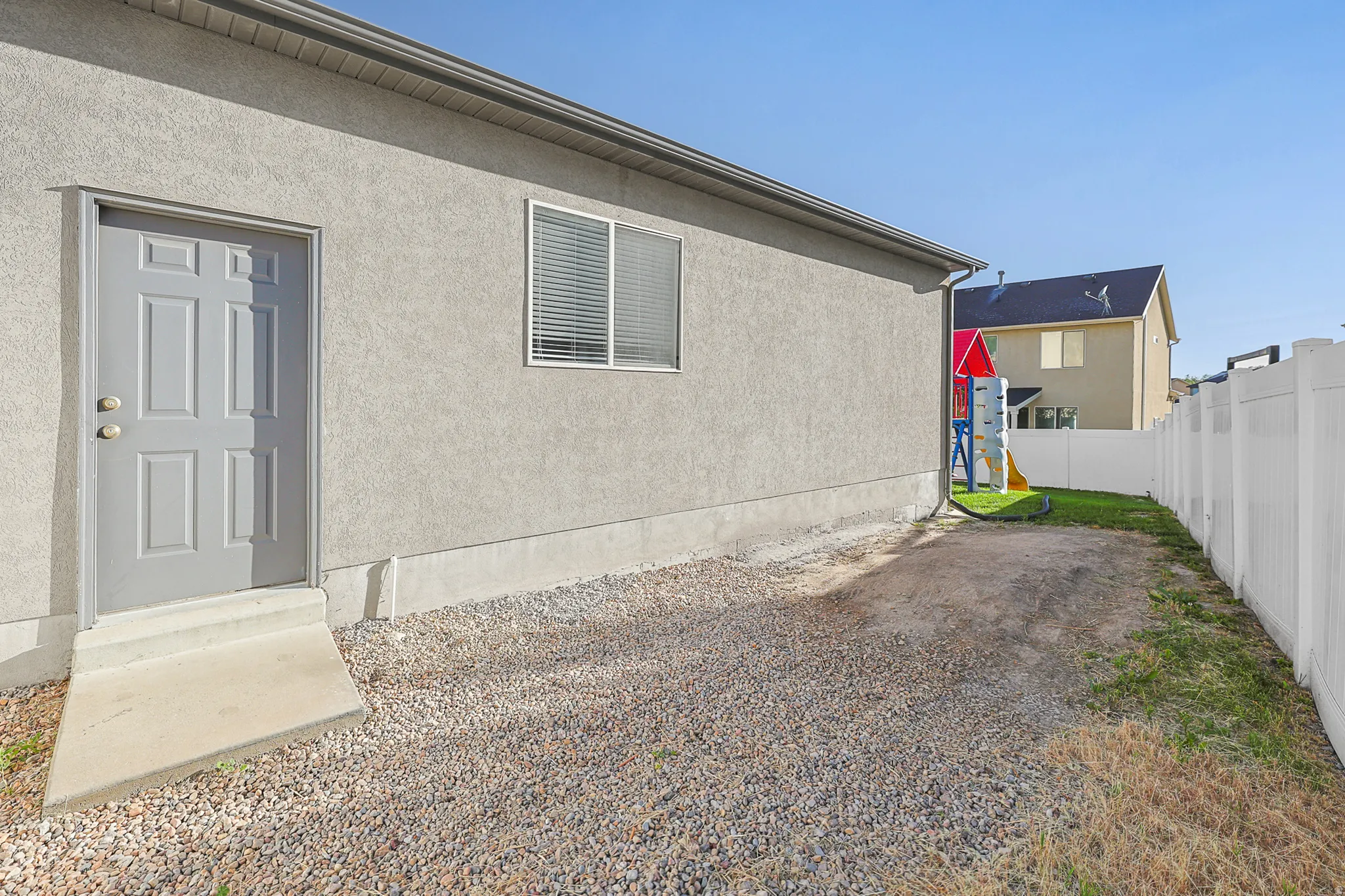 Side garage door to the backyard