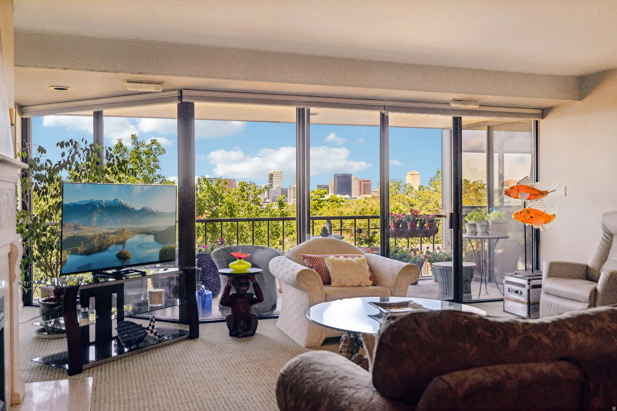 Expansive living area featuring floor-to-ceiling windows and a private balcony