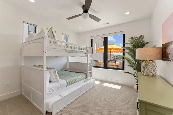 Room featuring a white bunk bed with a trundle, recessed ceiling lights, and a ceiling fan