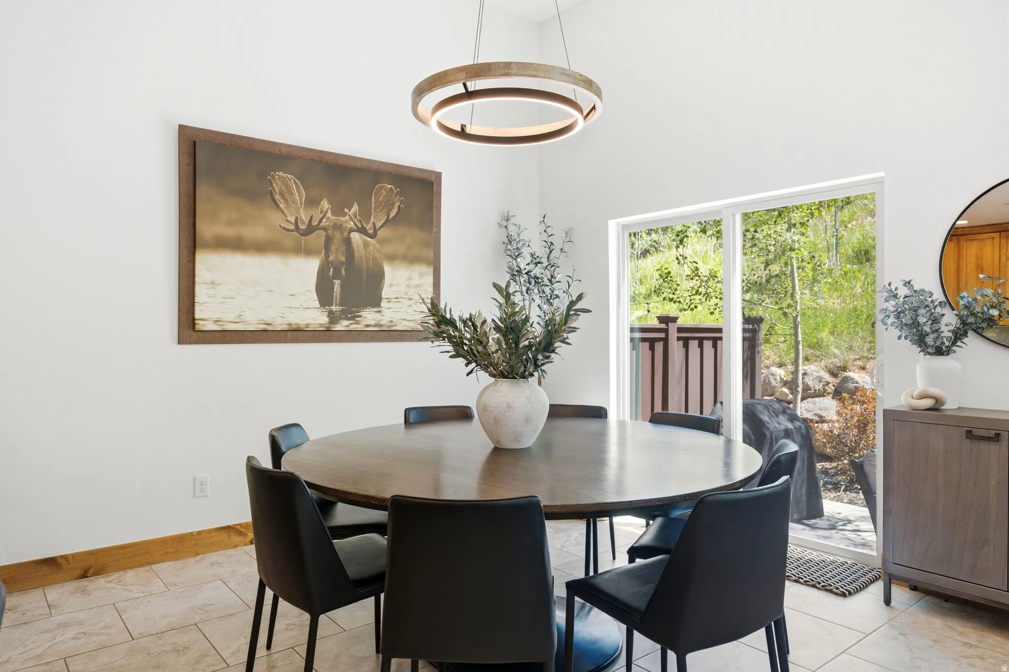 Vaulted ceilings complement the neutral wall finishes and tiled flooring