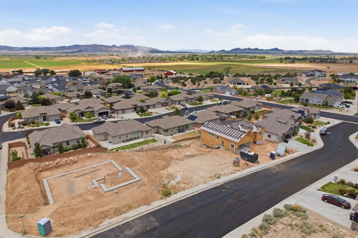 Residential lot with an excavated foundation and surrounding earthwork