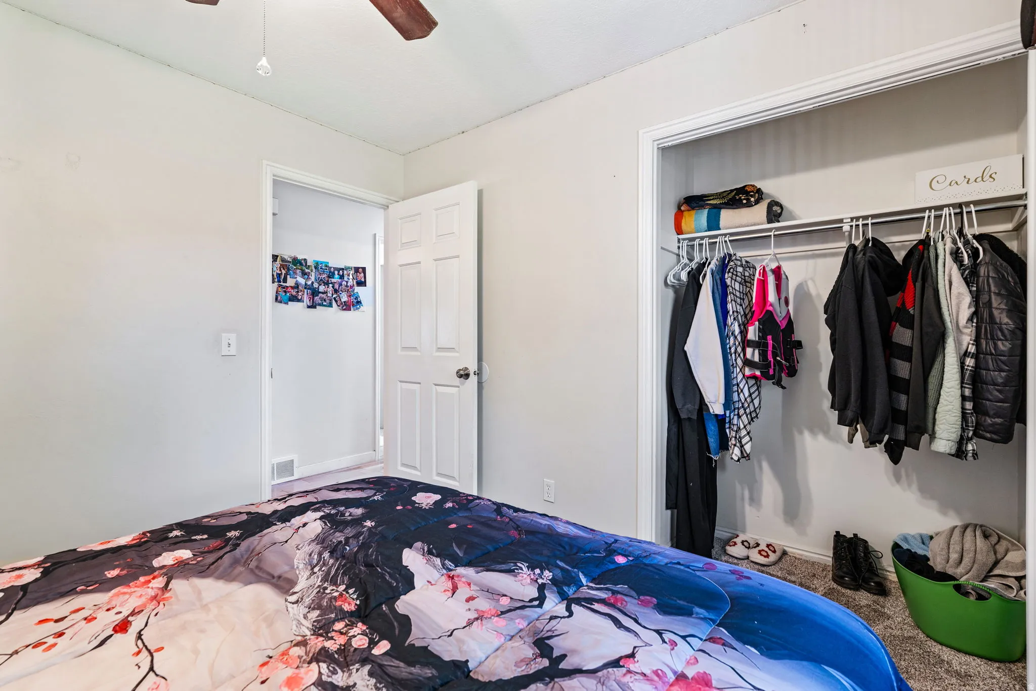 Bedroom featuring neutral painted walls and light-colored carpeting