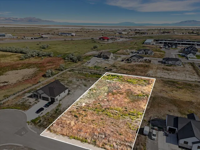 Generous land parcel outlined in white, featuring natural vegetation