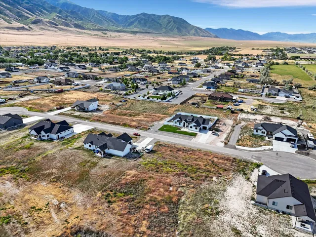 Aerial perspective showcasing a residential community with new construction homes