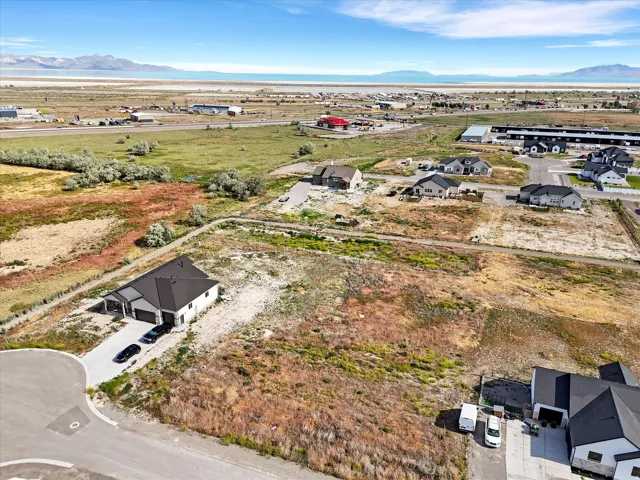 Expansive undeveloped lot presenting opportunities for new construction