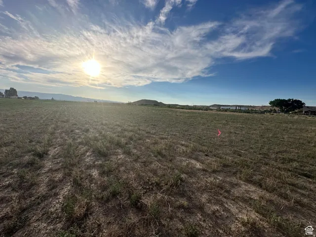 Expansive undeveloped land featuring a broad, level terrain