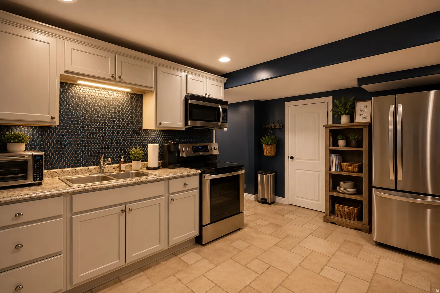 Kitchen featuring light-toned cabinetry, granite-style countertops, and a blue penny tile backsplash
