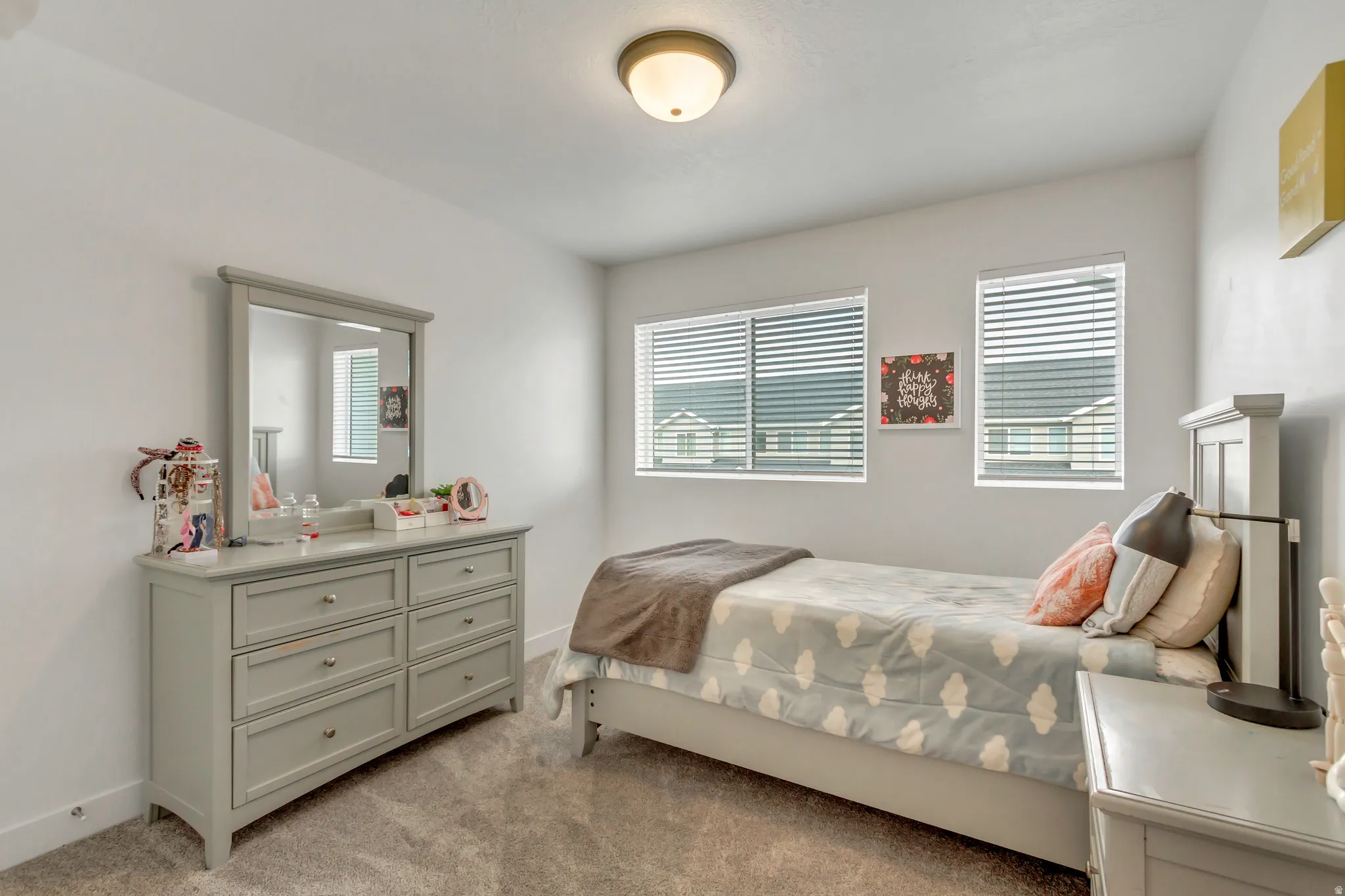 Room featuring light gray carpet flooring and white painted walls