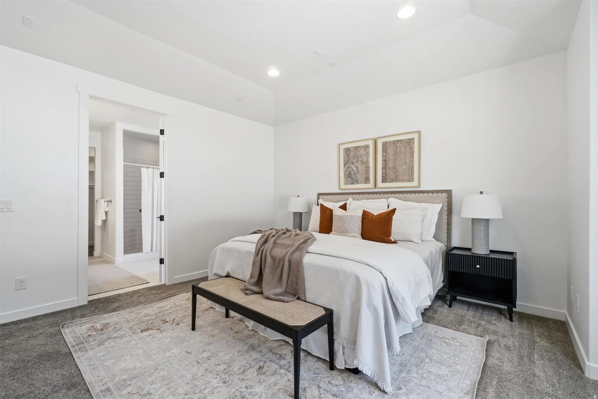 Spacious bedroom featuring recessed lighting and plush carpet flooring