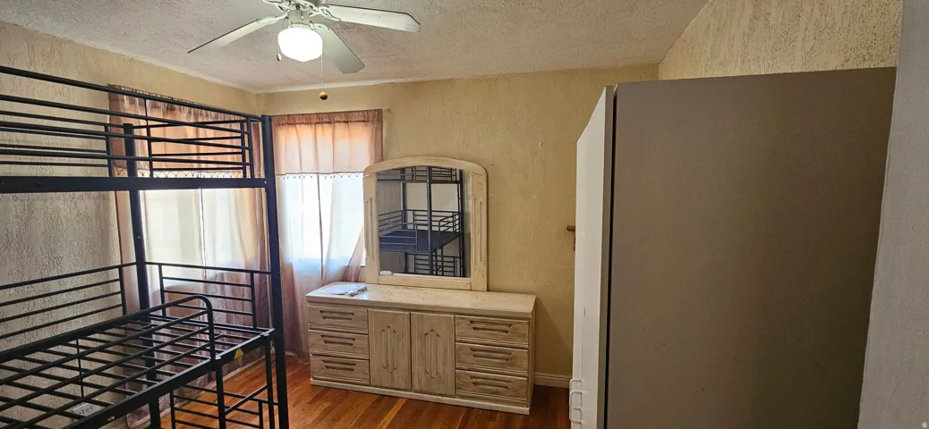 Hardwood flooring throughout the space