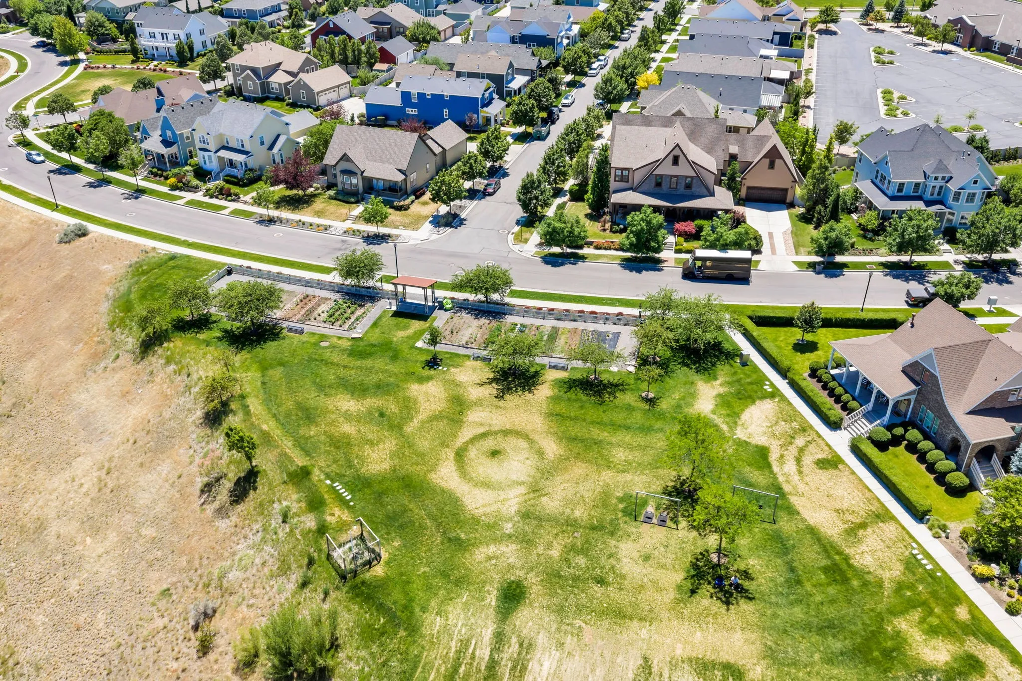 Expansive residential neighborhood featuring paved streets and manicured lawns