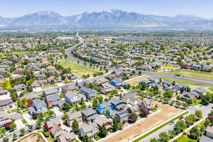 Expansive residential area featuring a variety of architectural styles, mature landscaping, and established roadways