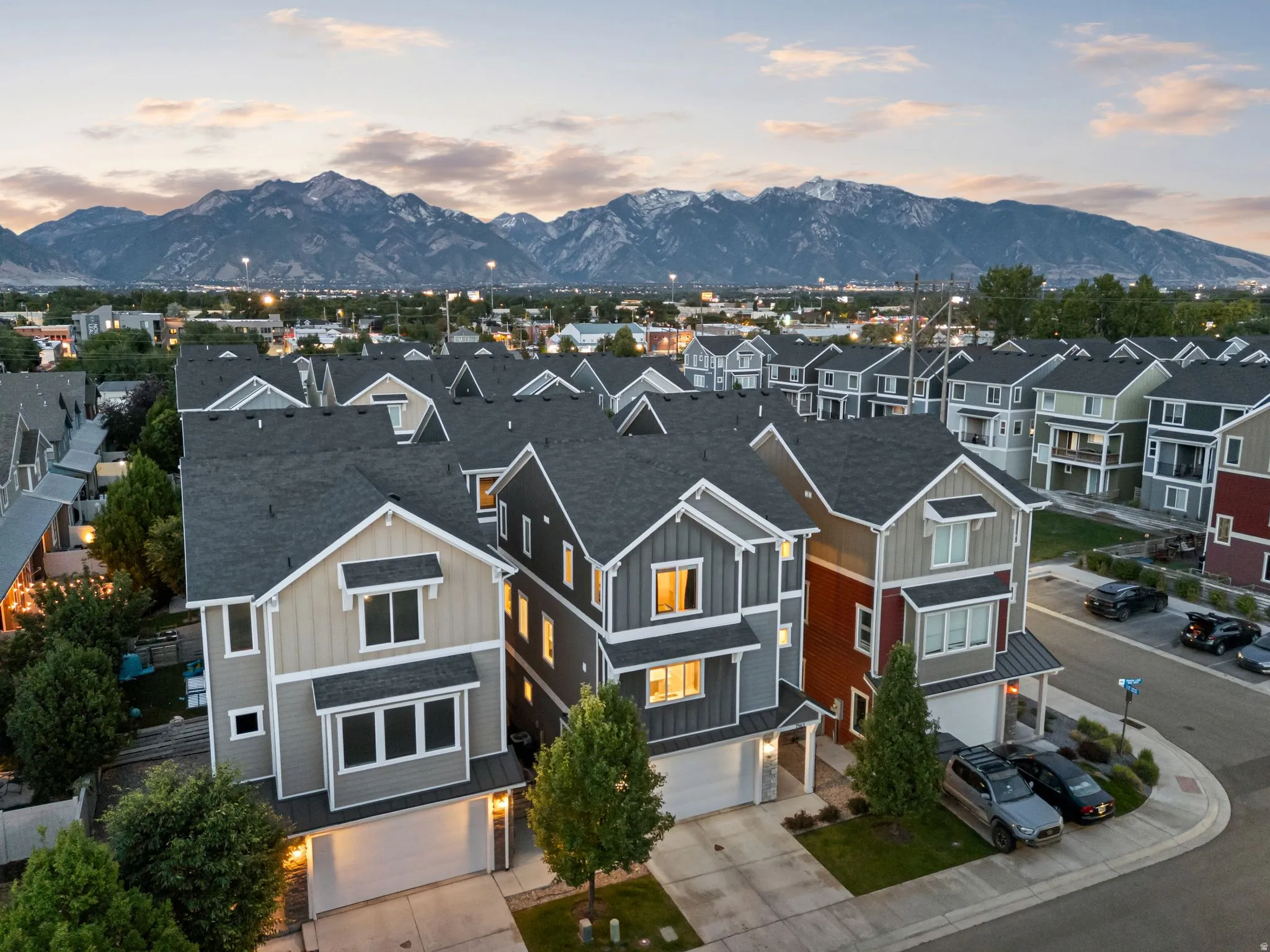 Contemporary townhome-style residences featuring multi-level designs and attached garages