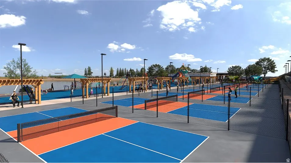 Multiple pickleball courts featuring blue and orange surfacing
