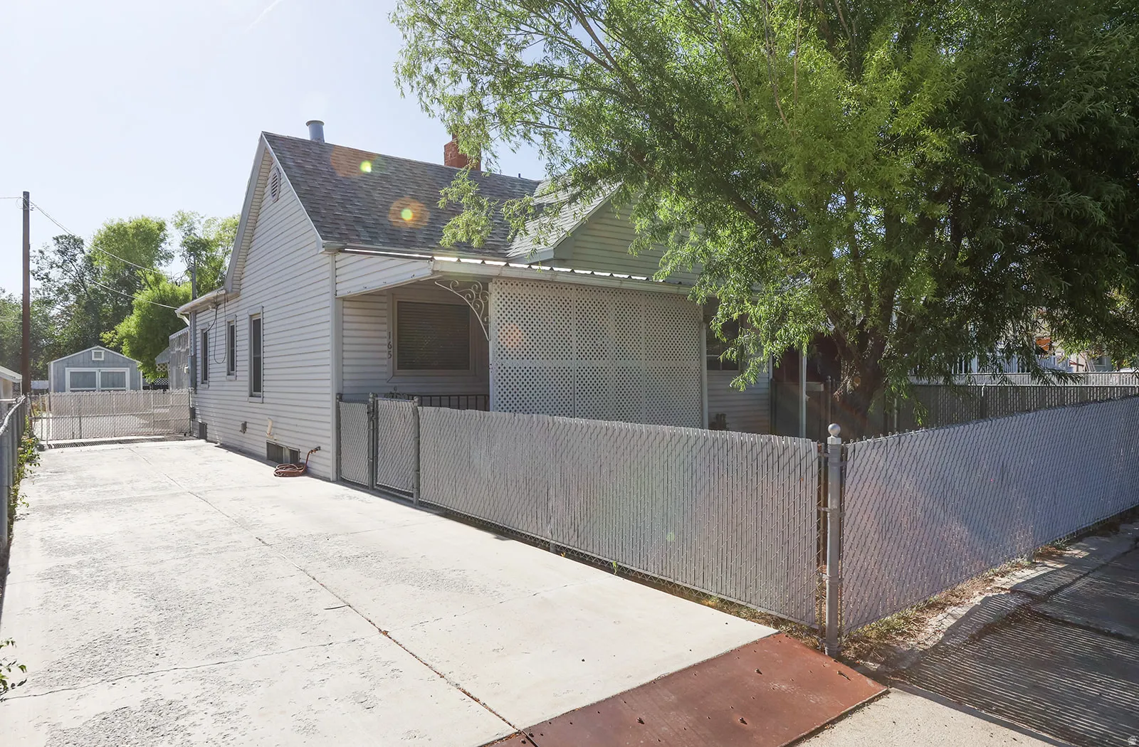 Concrete driveway with ample parking