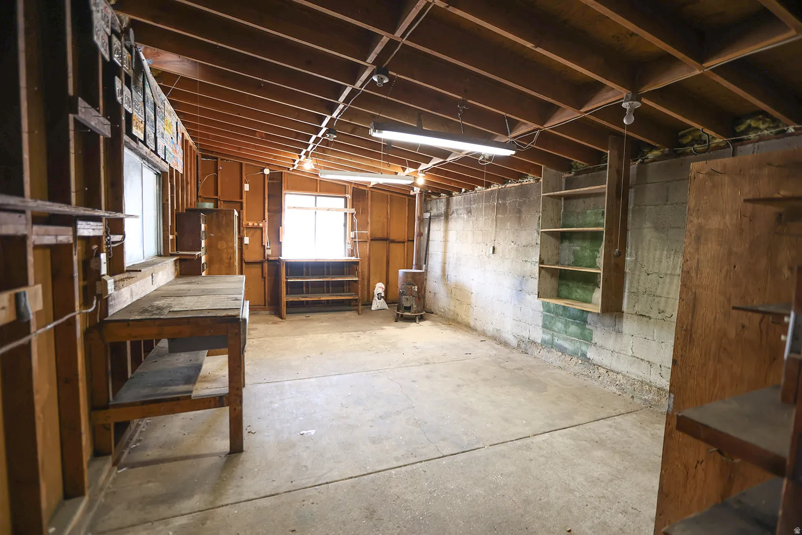 Fully enclosed workshop with wood stove.