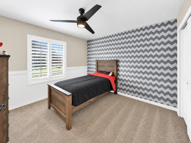 Neutral tone wall paint with a contrasting chevron pattern accent wall