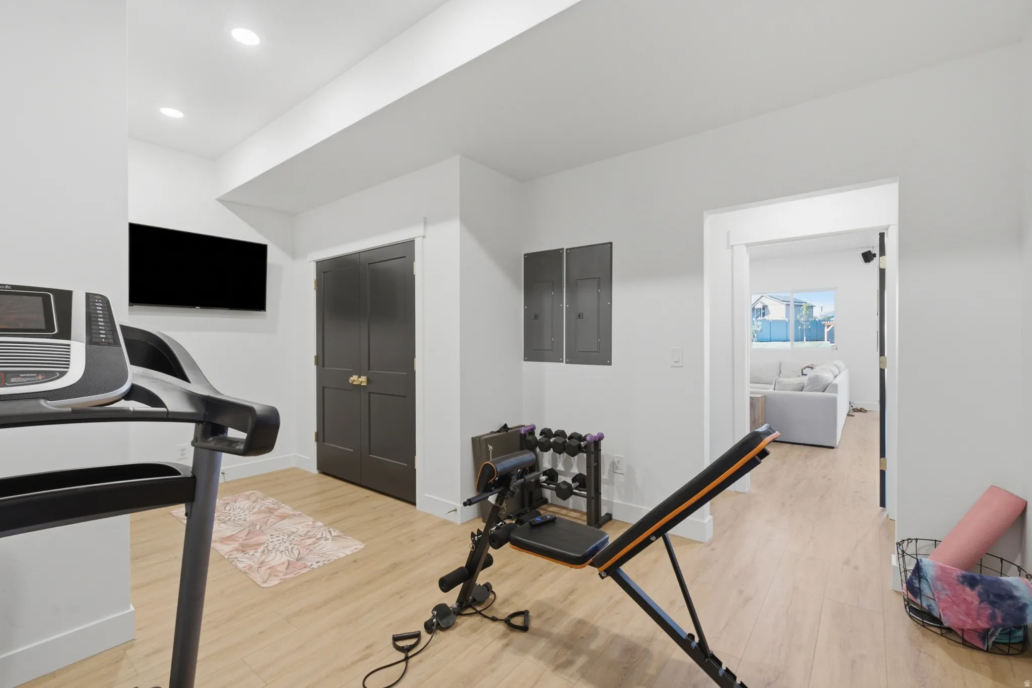 Dedicated interior space featuring light wood-finish flooring