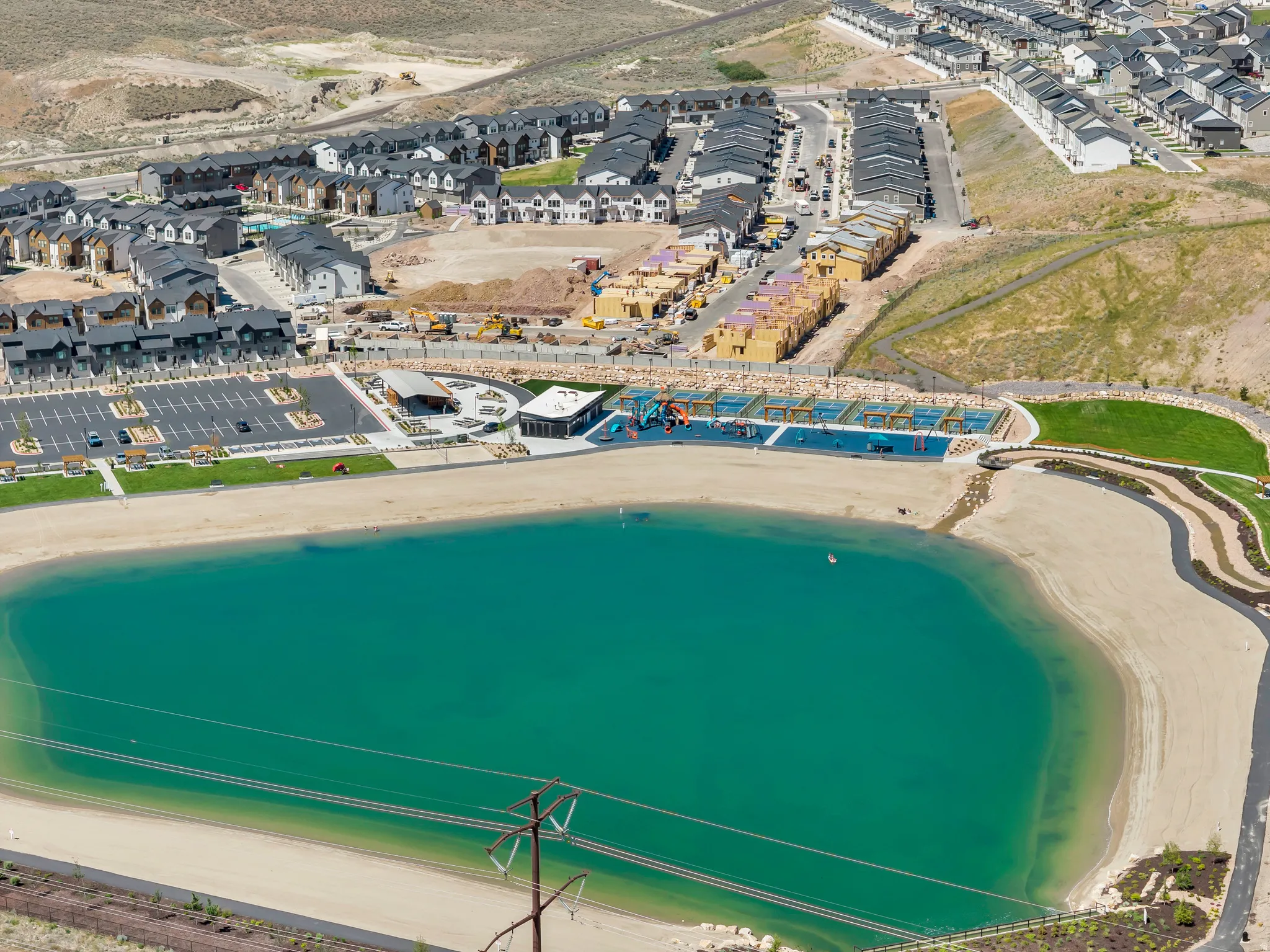 Expansive artificial lake with sandy beaches