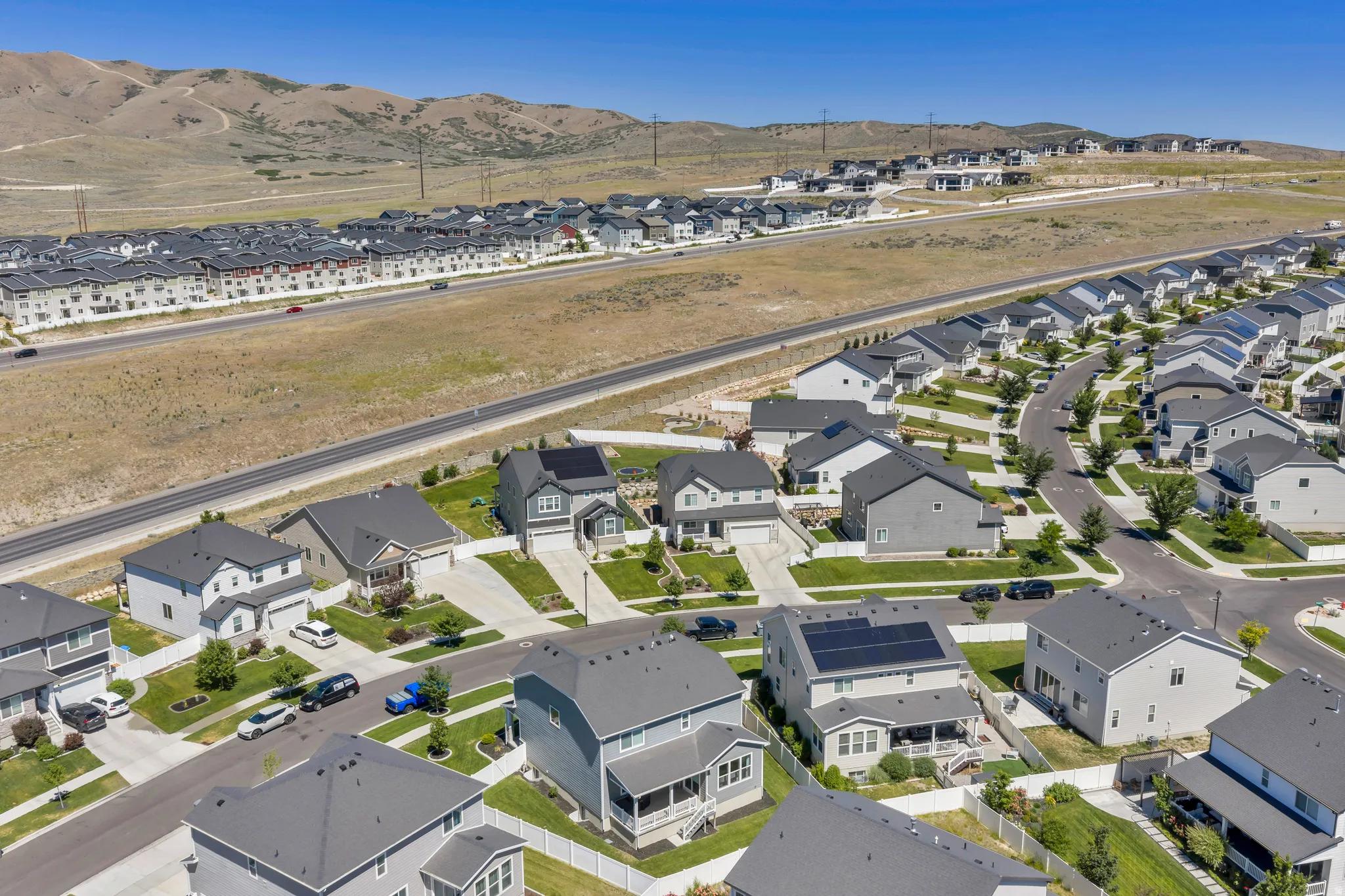 Aerial perspective showcasing a developed residential community with varied architectural styles