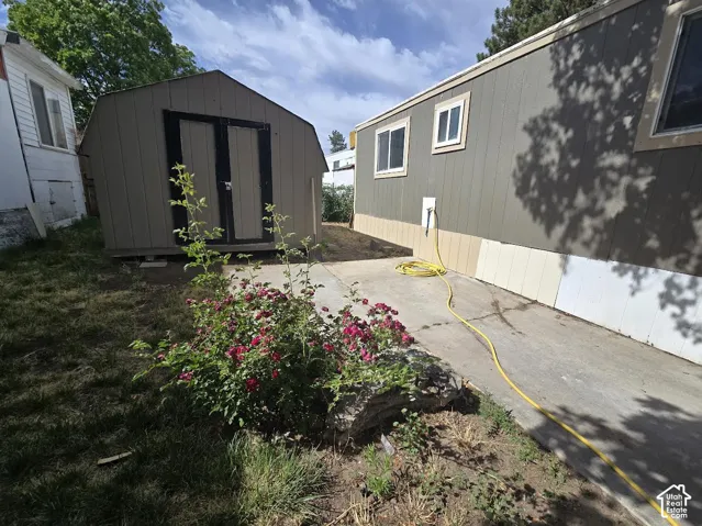 Detached storage shed with double doors