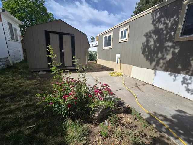 Detached storage shed with double doors