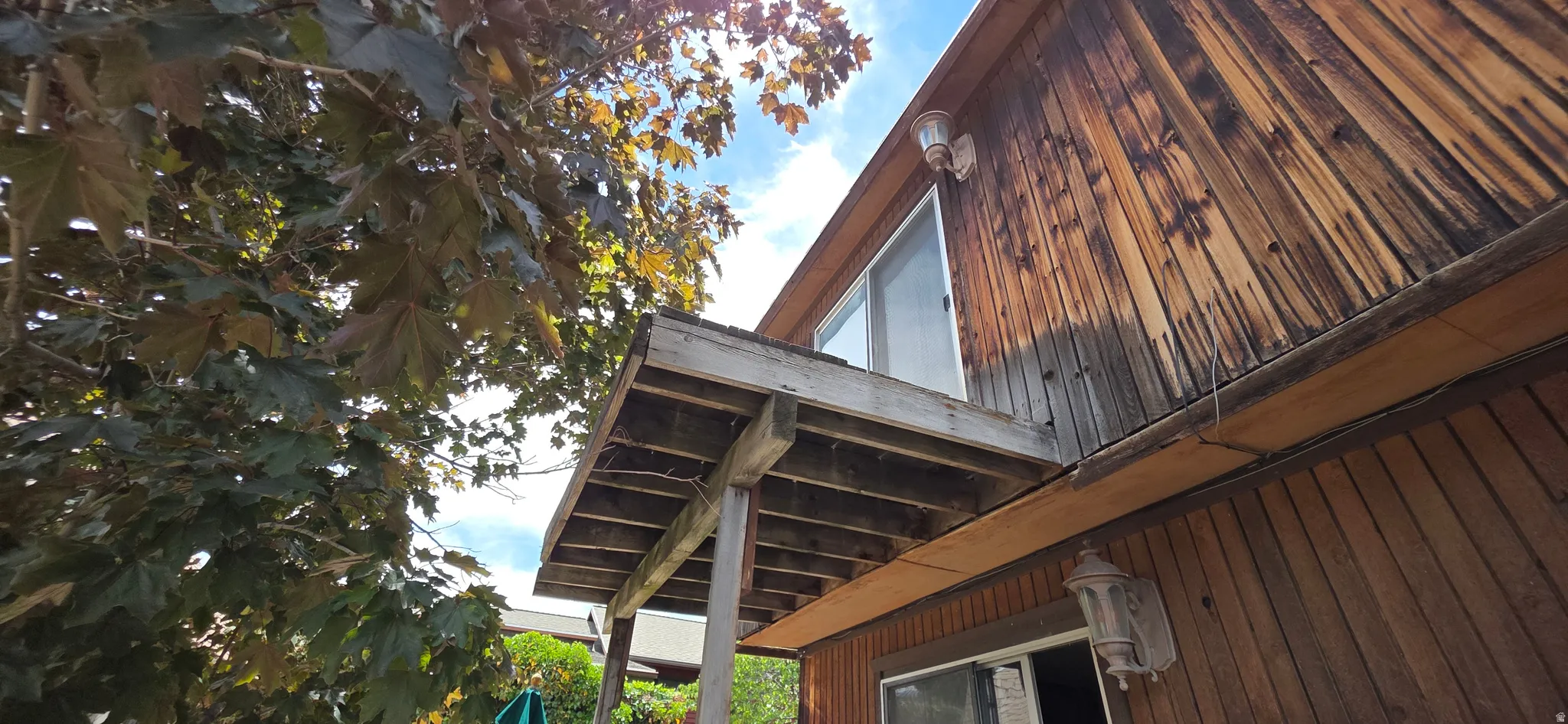 Primary bedroom has walkout deck but needs repair