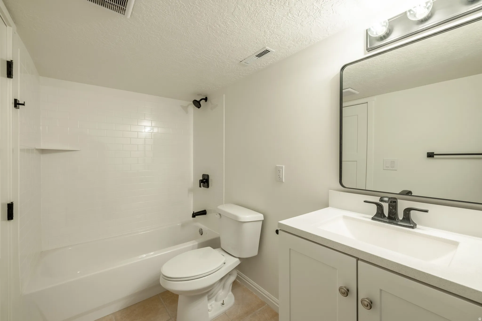 Bathroom connected to bedroom in basement