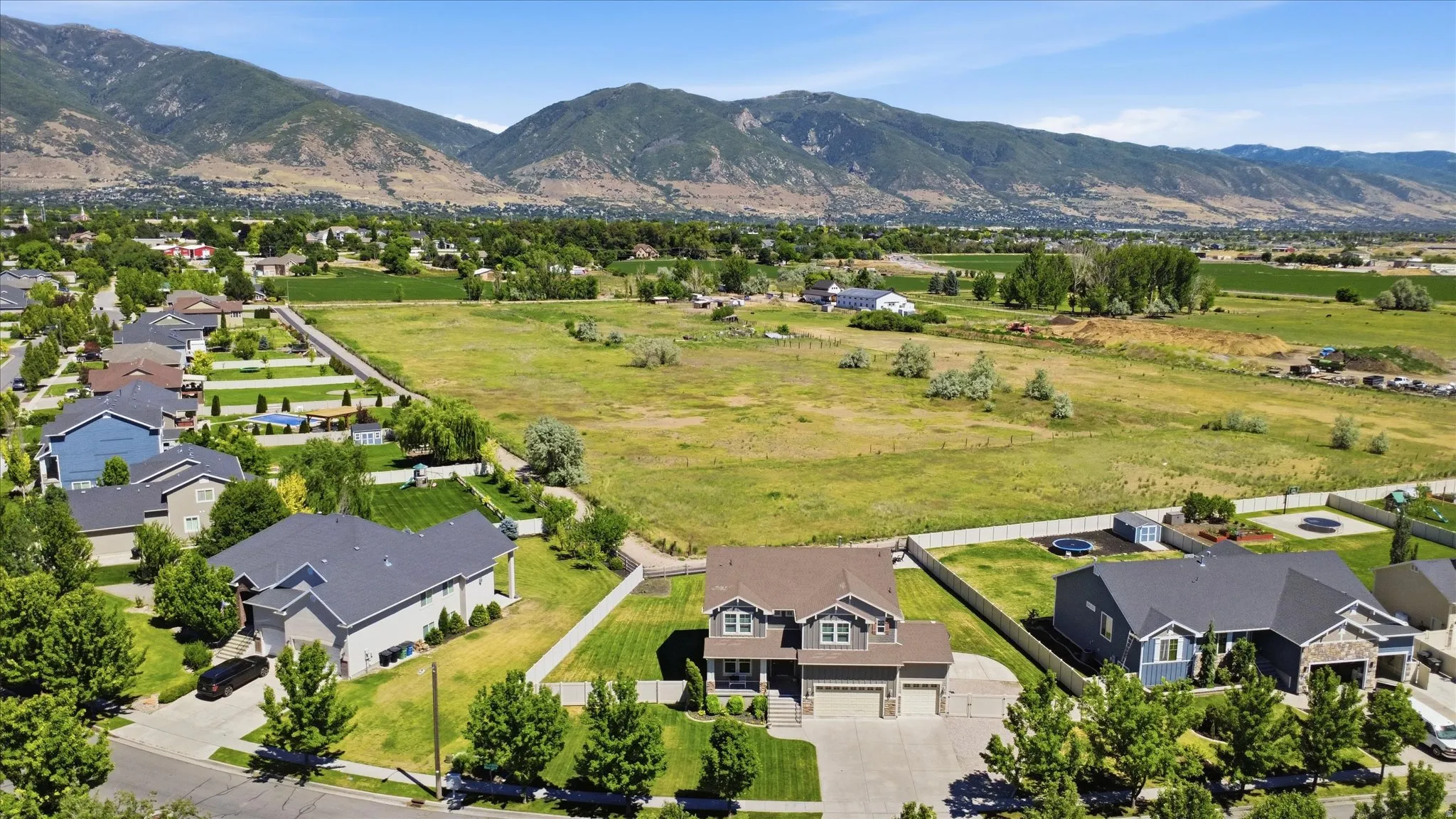 Subject property backing walking trail and field.  Beautiful mountain views.
