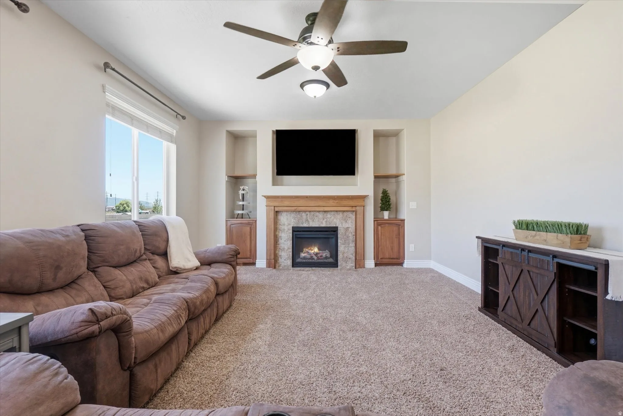 Main floor great room with fireplace