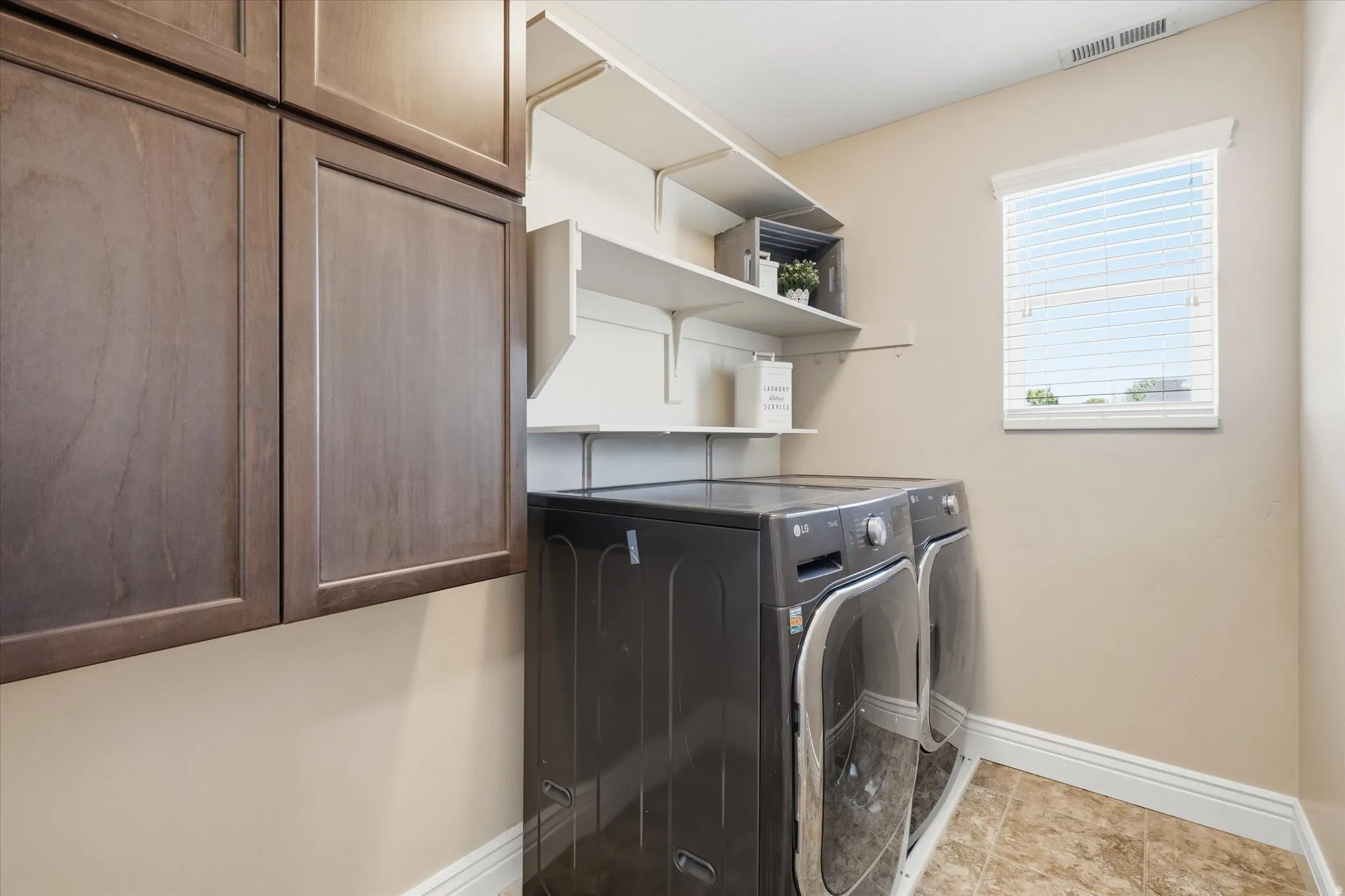 Laundry conveniently located between 2nd level bedrooms
